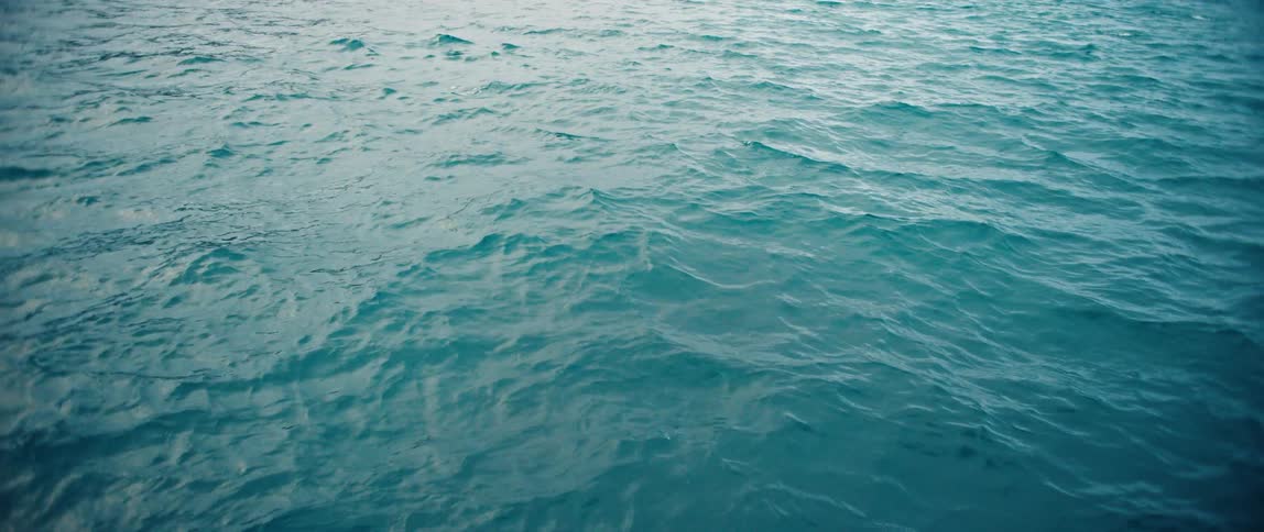 A view of the ocean with water flowing