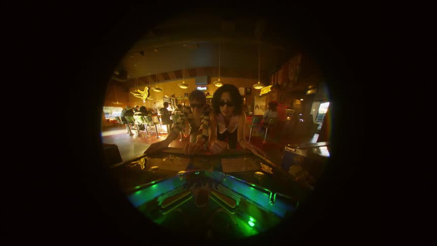 Friends playing at a diner during the day