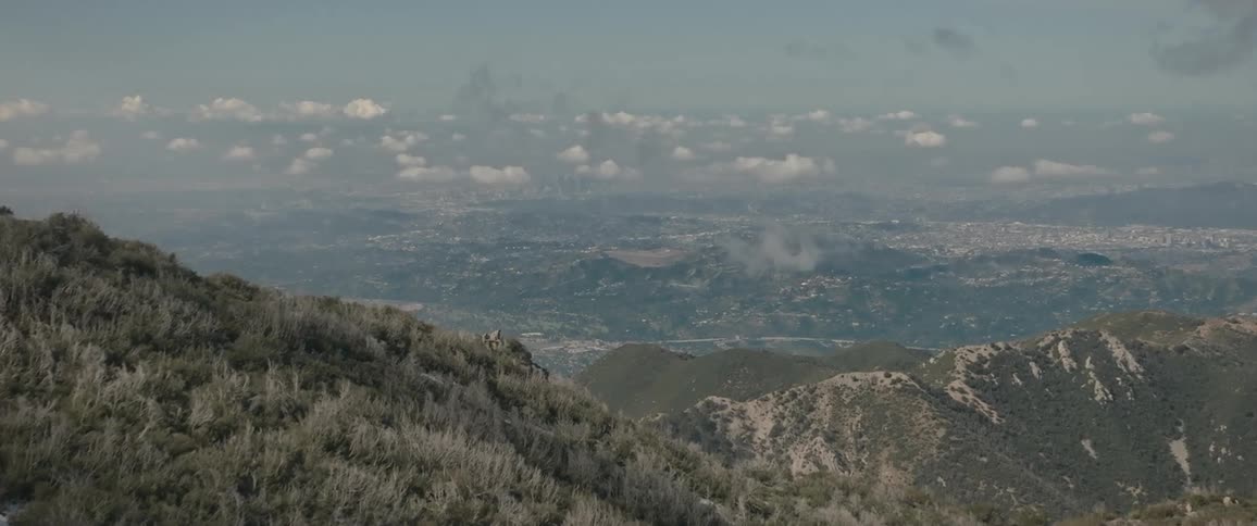 Aerial view of snow covered mountains