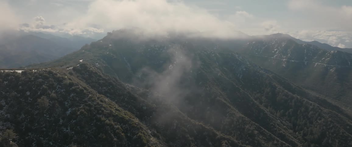 Aerial panorama of a mountain range with peaks