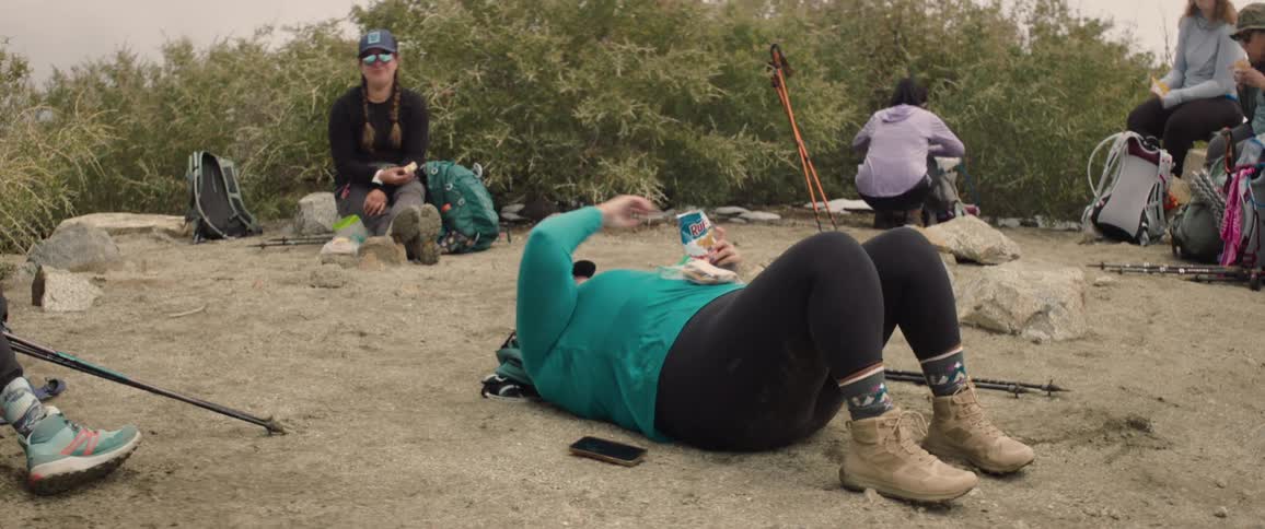 A group of friends in a camp resting
