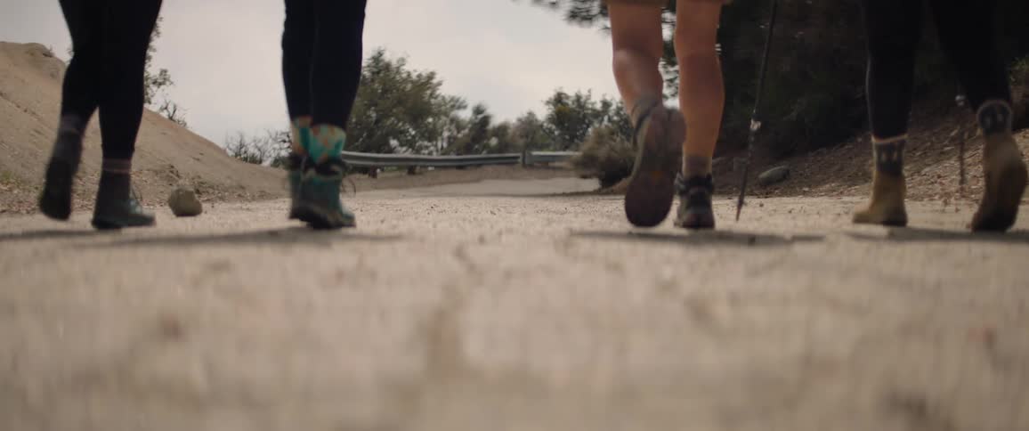 Women hike down the trail