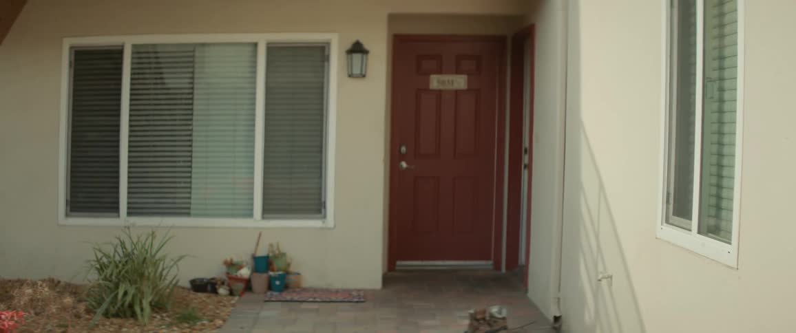 A clip of a female entering into her room