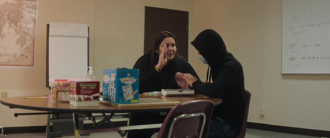 A clip of a person assisting another
