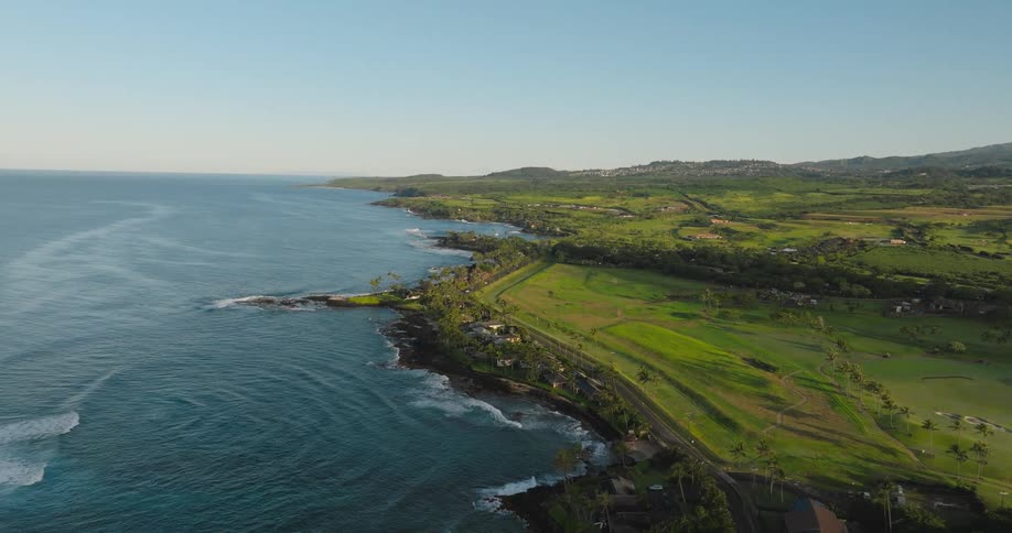 Aerial panorama of the blue sea and a bay with a road
