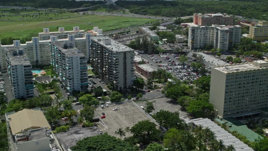 Aerial panorama of a metropolis with resorts along the roadside