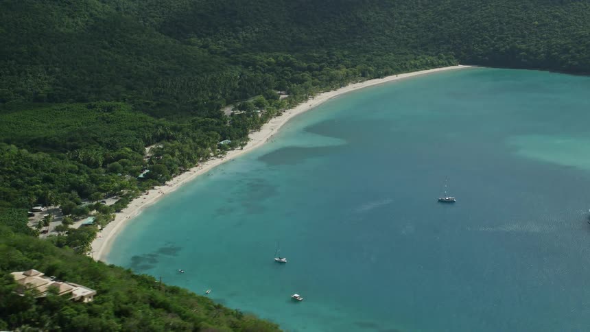 Skyline of a tropical coastal island with forested mountains