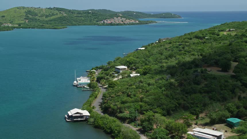 Aerial panorama of islands and bays with yachts docked on a clearsky day