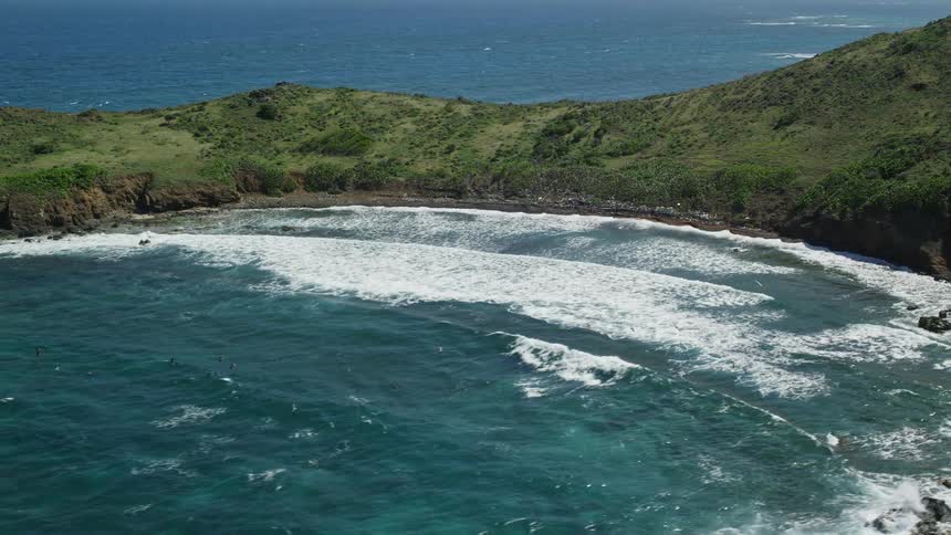 Aerial panorama of a bay with turquoise blue sea