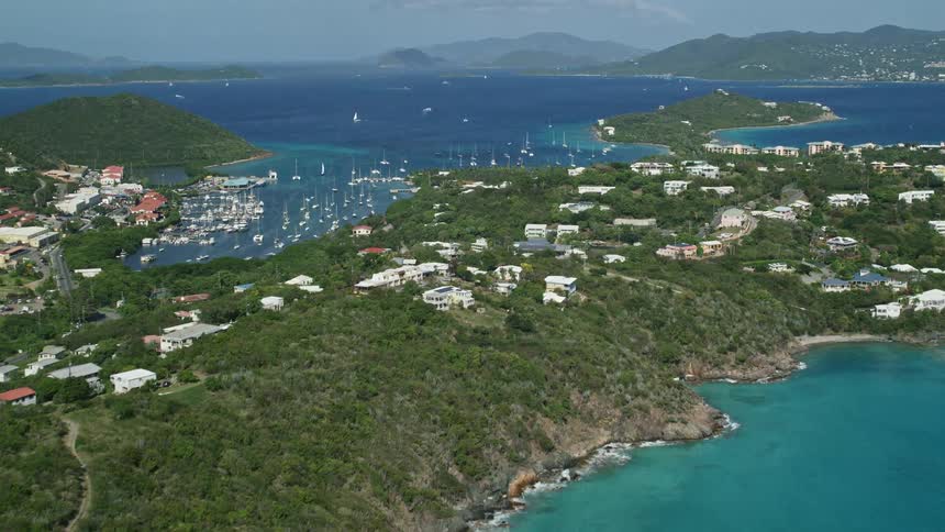Aerial view coastal community boats and harbor