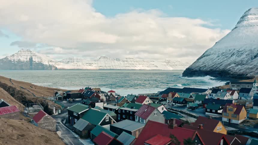 Aerial view of seafront houses at the bay