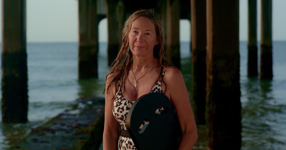 A portrait of a woman close to the shore