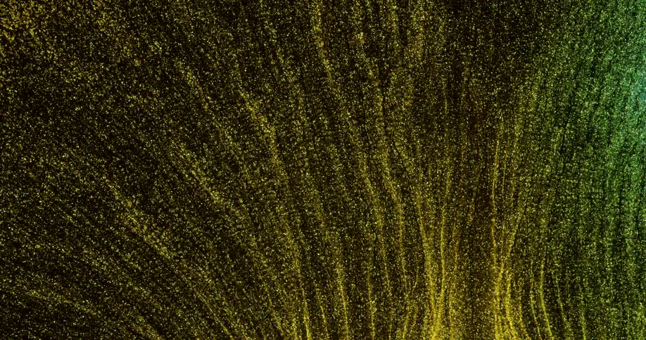 Yellow and green liquid glitter moving