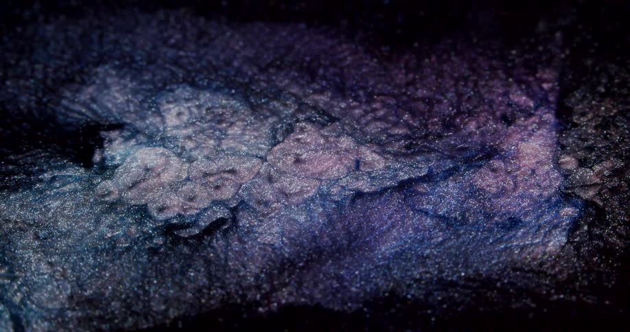 A bright blue and purple nebula in the galaxy