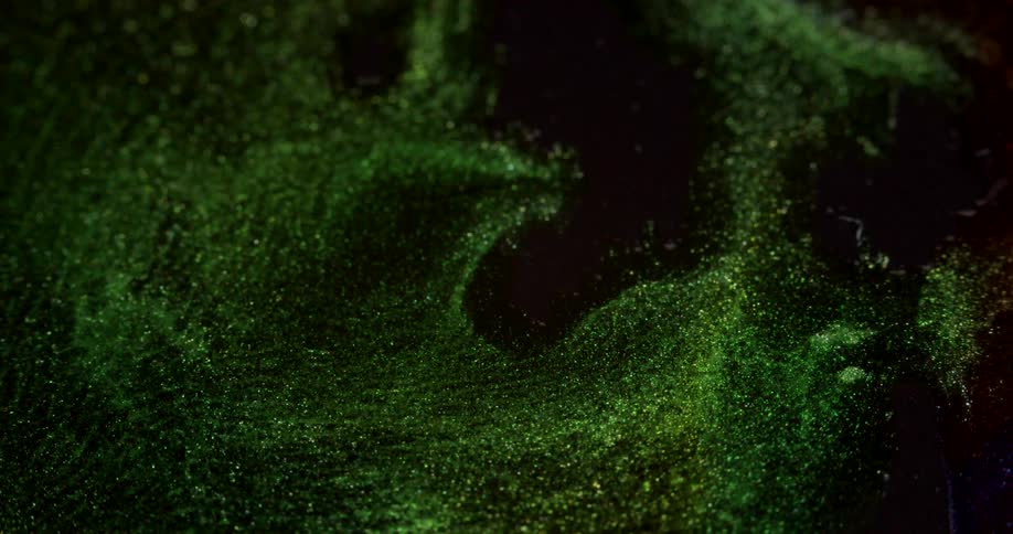 Some green inks shimmering outdoors