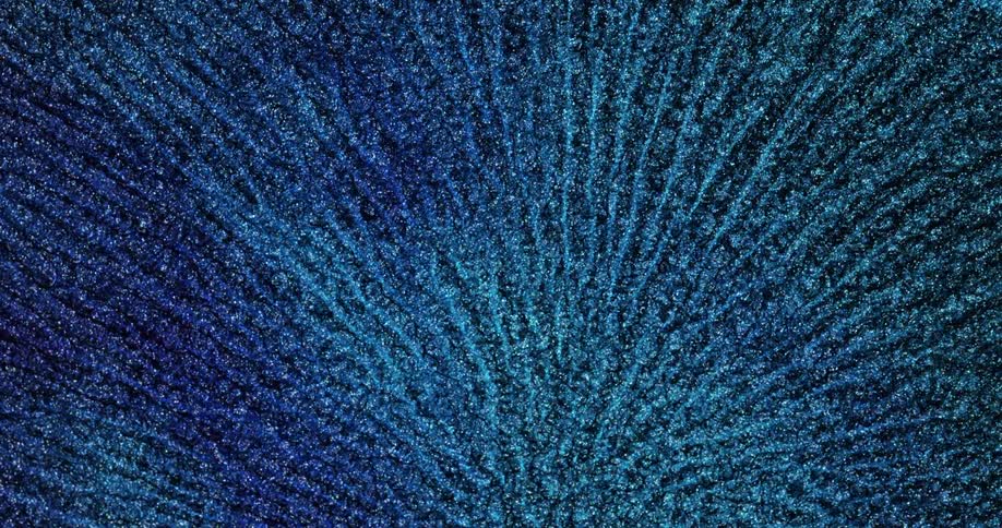 Several blue particles moving in different directions