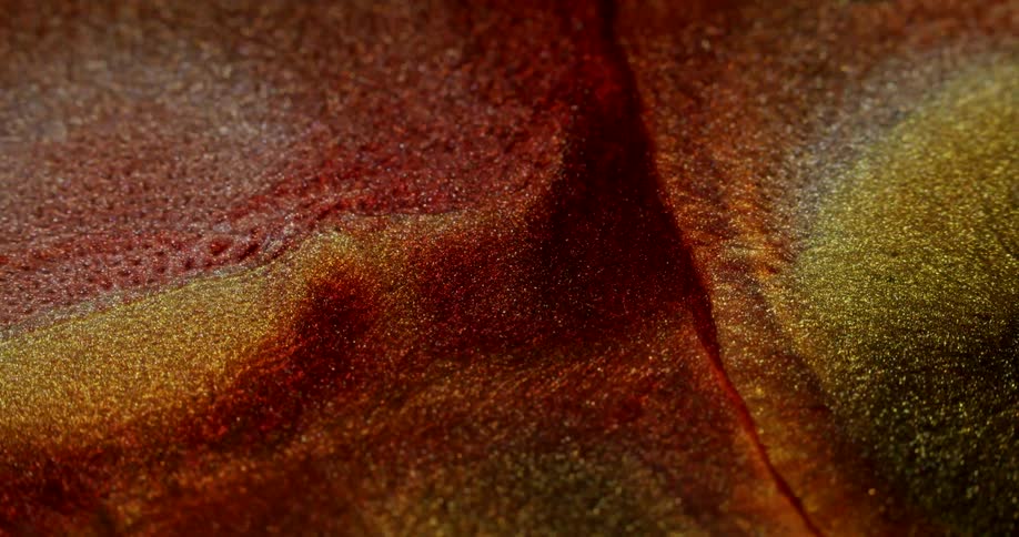 Orange white and red inks moving towards each other slowly
