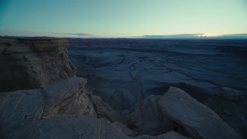 Panoramic view of a rocky and sandy valley at dawn