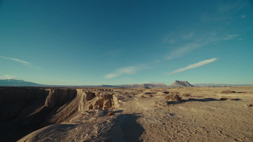 Panoramic view of a rocky terrain on a day with a blue sky