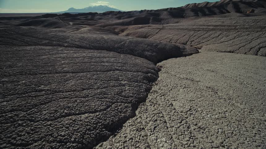 A rocky soil with a rough surface and some cracks