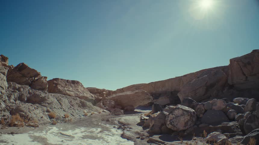 Aerial of a rocky valley on a sunny day