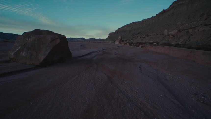 A region with earthen soil and some small rocks