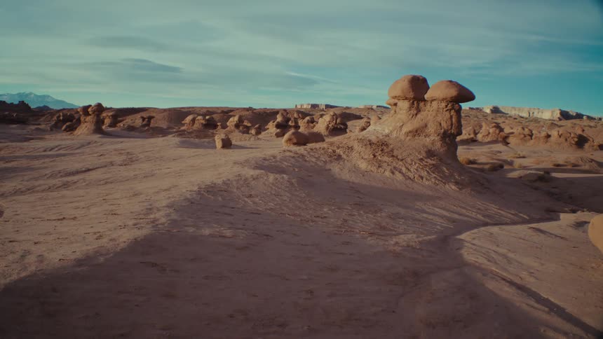 A desert in the afternoon with clouds sailing overhead