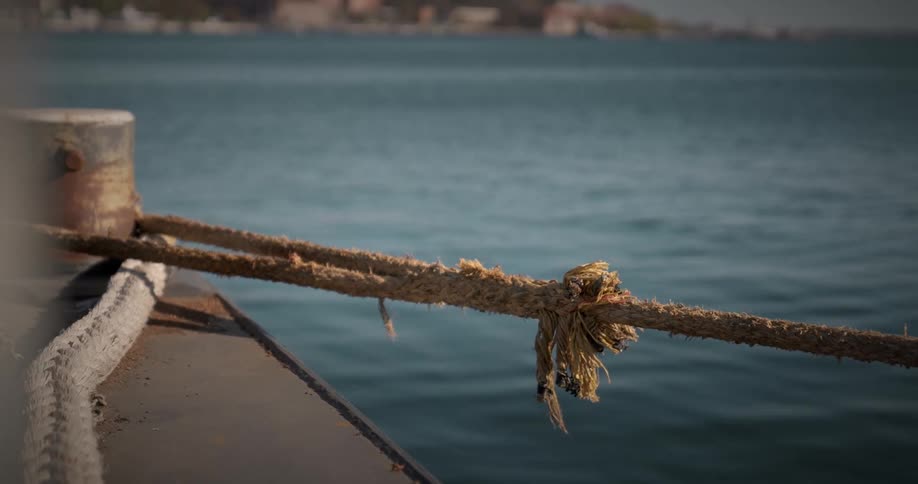 Rope tied to a dock by the seaside
