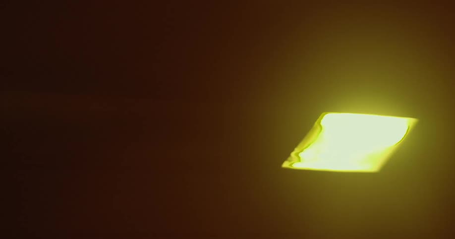 Ceiling lights create glare and streaks during passage through tunnel