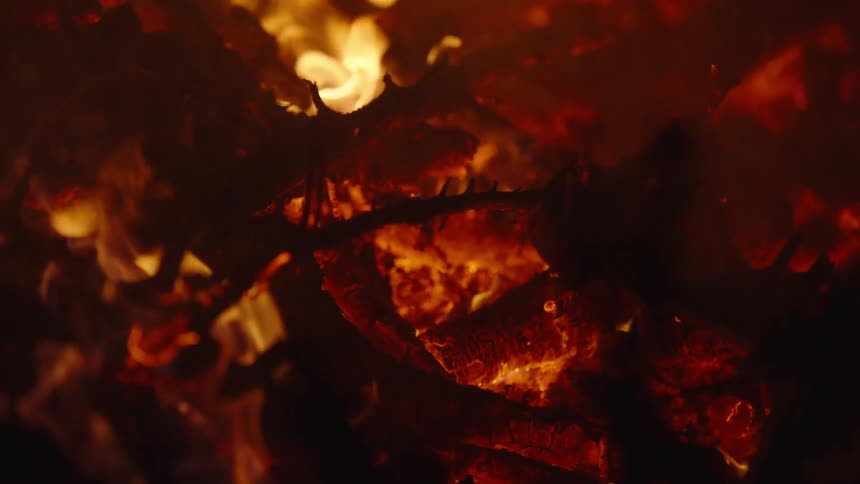 Flames from a bonfire lit during the night
