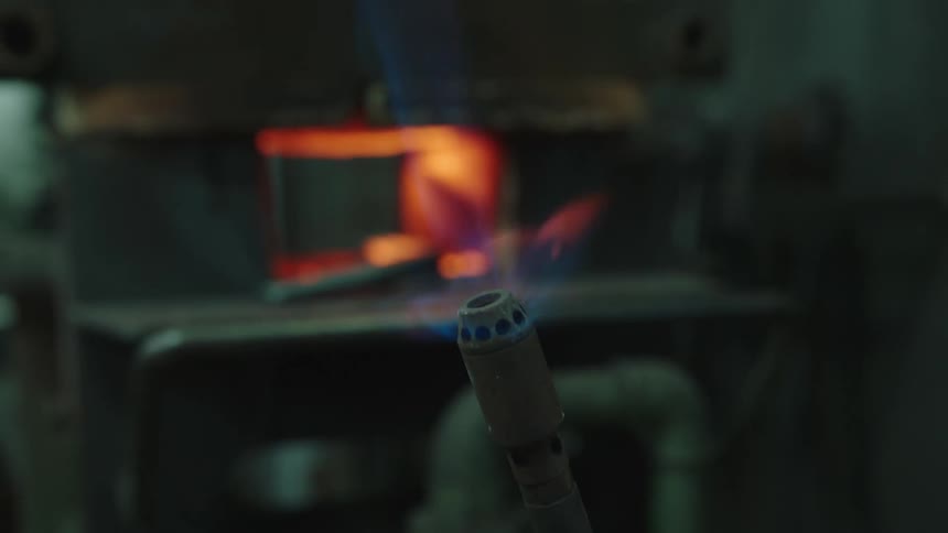 Flames shoot out of a torch