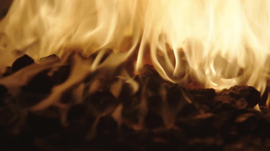 A fire burning in yellow flames