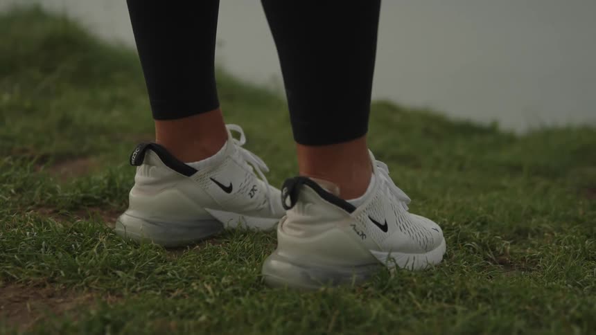 Closeup of a running shoe on the grass