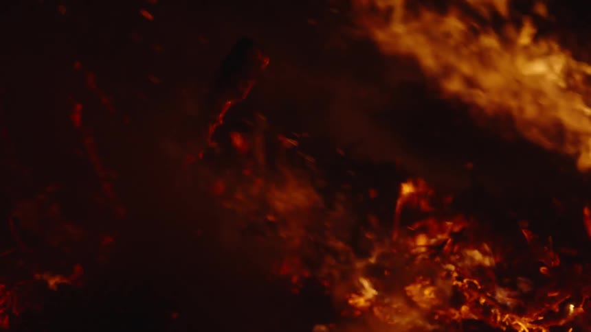 Wood on fire during a fire at night