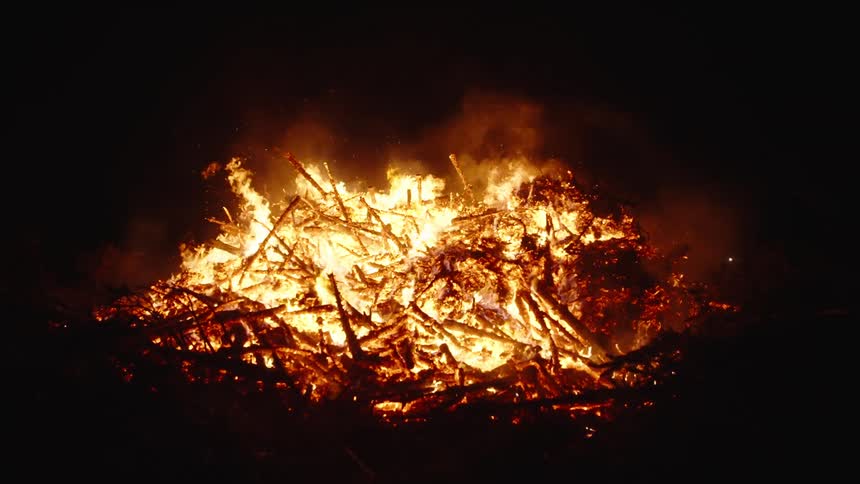 Burning in slow motion at night