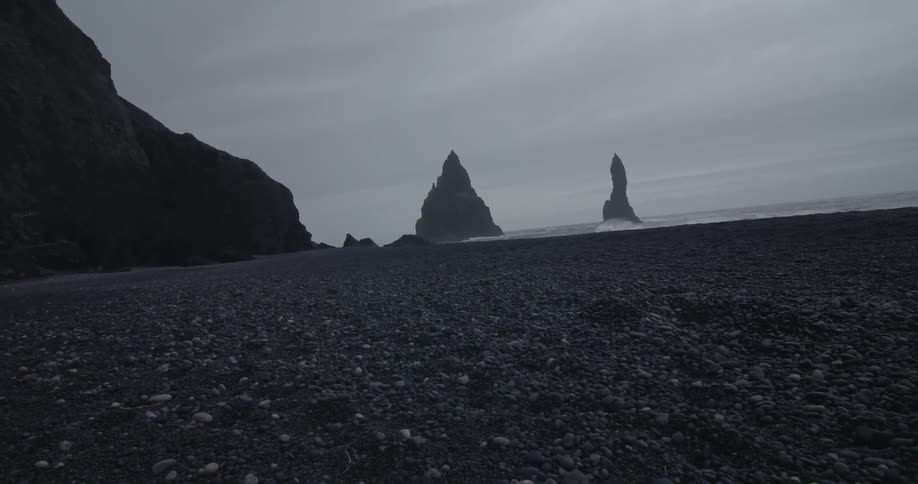 Waves crash into the rocky shoreline