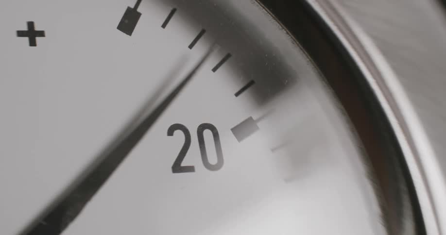 Watch hand rotates across face of stopwatch
