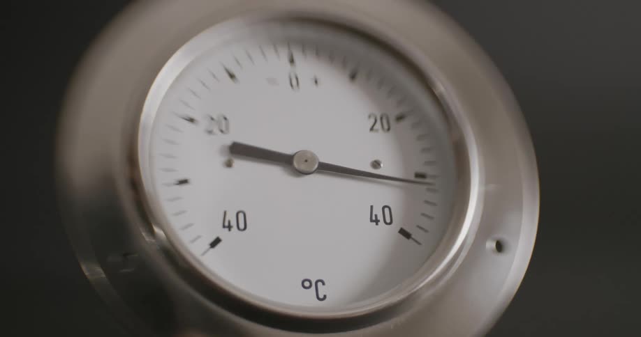 A dial on a thermometer spins around