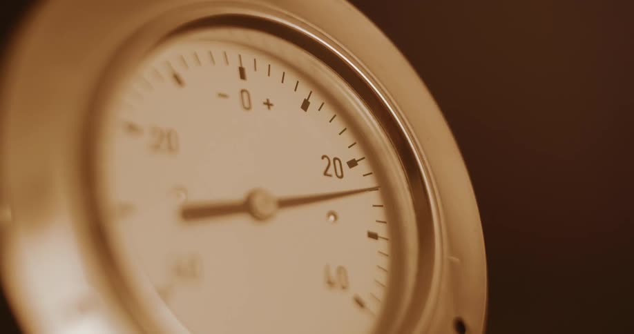 A pressure gauge with a pointer is moving to the right until the largest number