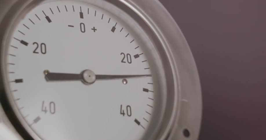 Closeup of a moving pressure gauge