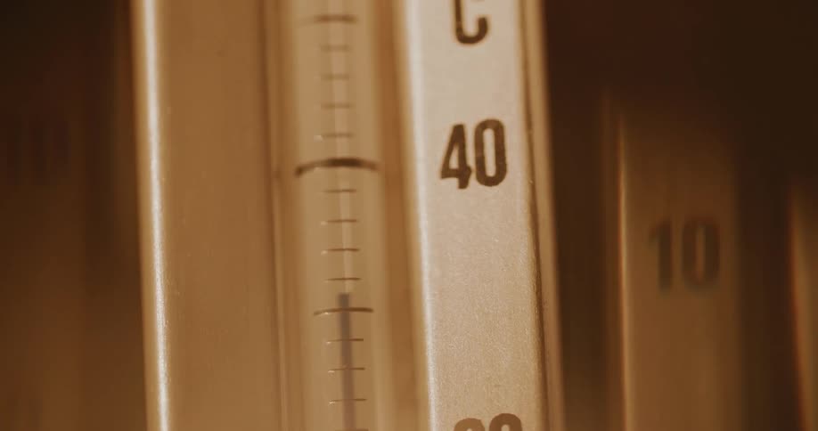 Extreme close up of a rising temperature gauge