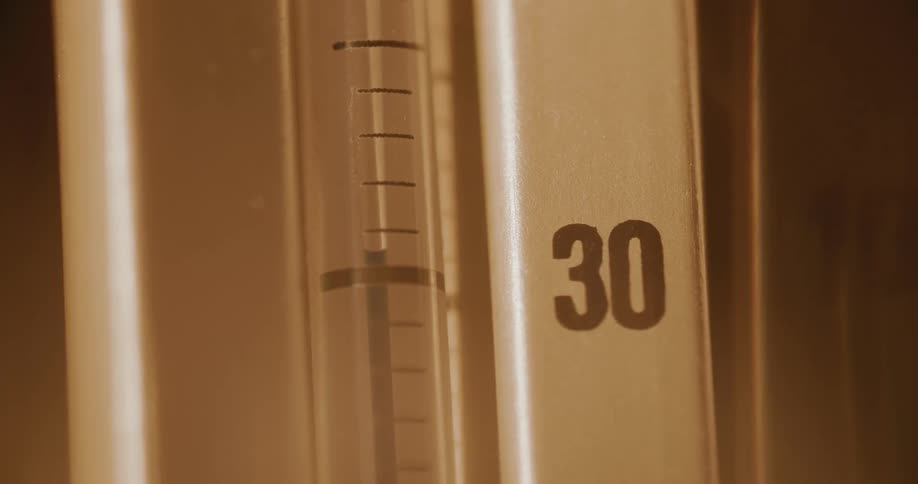 A thermometer showing the temperature rapidly rising