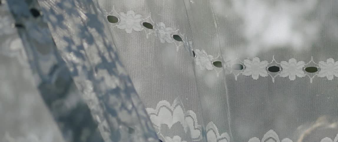 Sheer fabric moves in the breeze