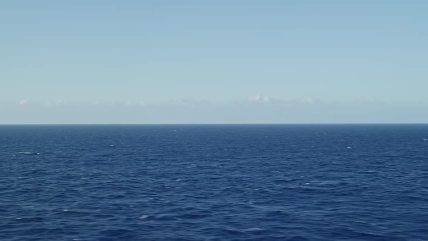 Panorama of the blue ocean on a cloudless sky day