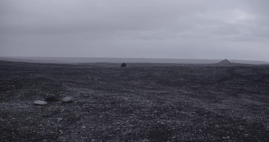A barren field on a cloudy day