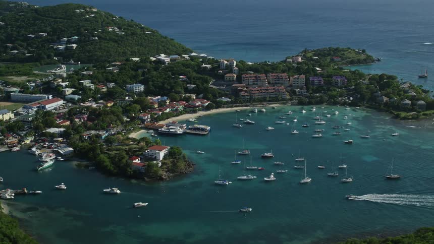Aerial view coastal community boats in harbor