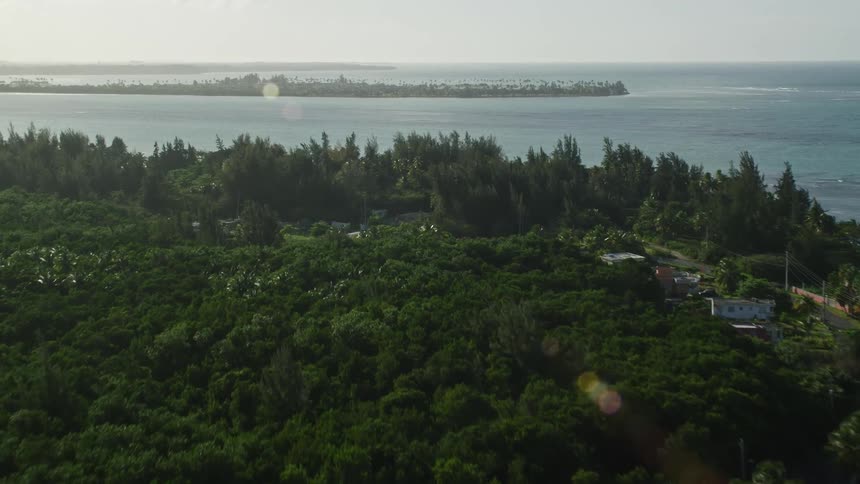 Aerial panorama of turquoise seaside islands with residential houses