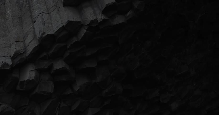 The cave has a high entrance and is very dark