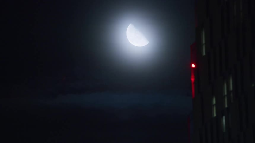 View ascending on a night with a sight of the moon