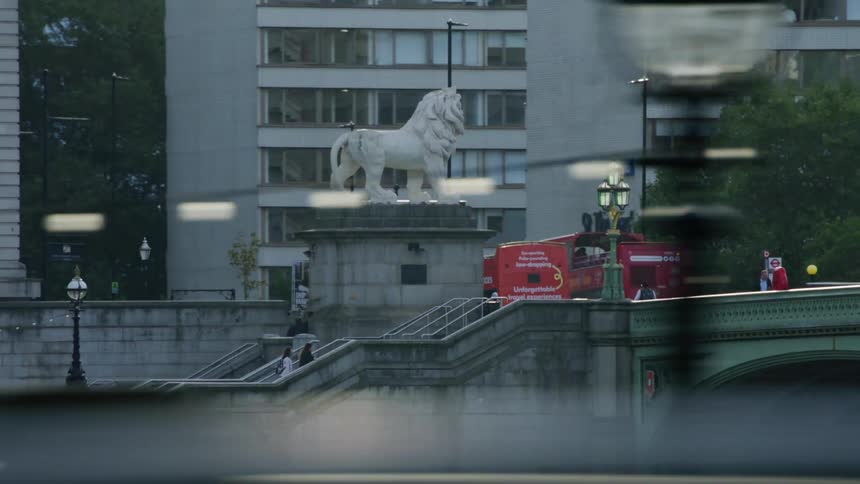 People walk up the steps in the city
